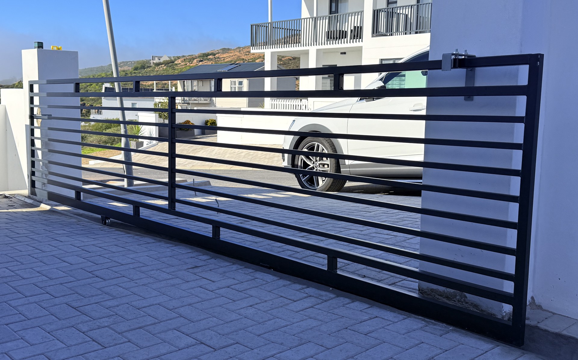 Custom driveway gate by Steelforge